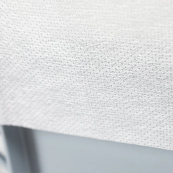 Sac filtrant non-tissé pour déshydratation, vue détaillée de la structure fine ponctuée du non-tissé blanc Sac filtrant non-tissé pour déshydratation, vue détaillée de la structure fine ponctuée du non-tissé blanc
