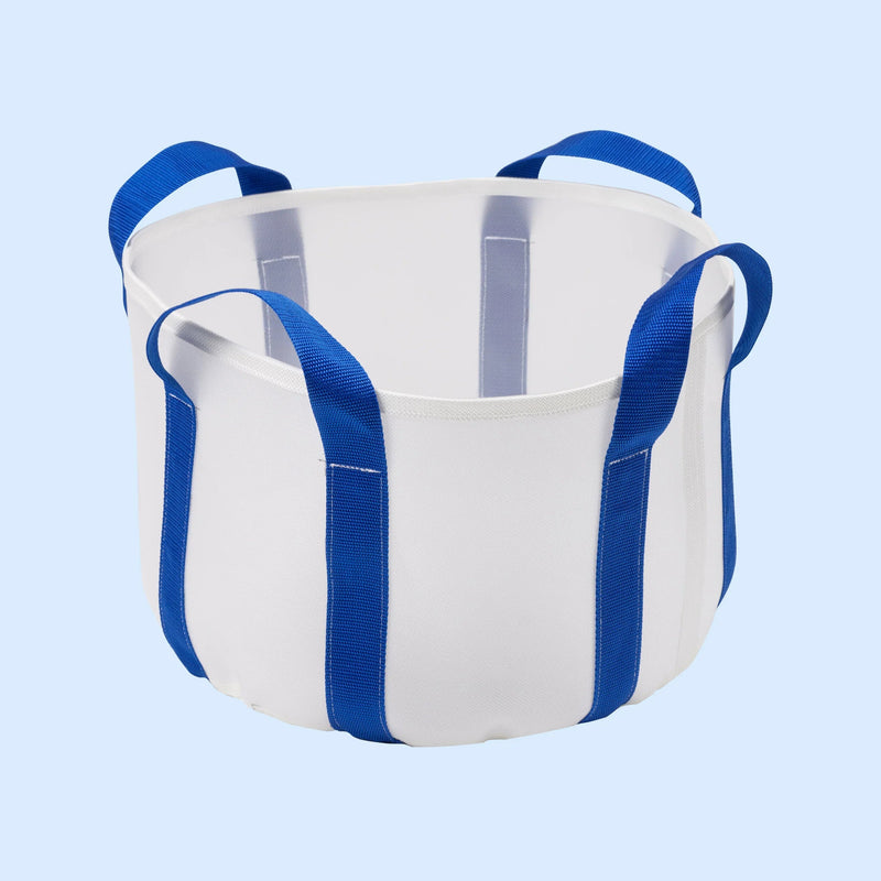High-throughput centrifuge filter bag shown as a white cylindrical bag with blue straps and loops