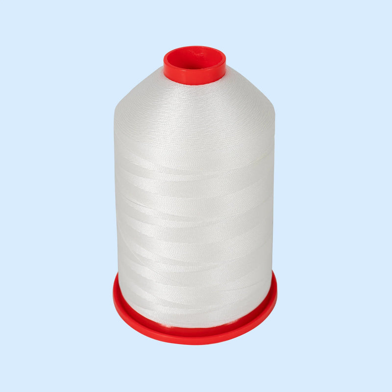 Industrial sewing thread for filter repair shown as a white thread cone with red plastic core