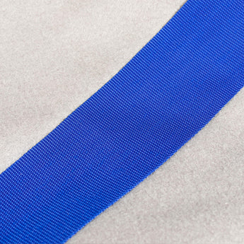 Filtersack Schlammentwässerung Filtersack Schlammentwässerung 0,125 m³ mit blauem Gurtband und sichtbarer Struktur