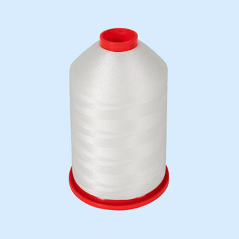 Nähgarn Filter Reparatur Nähgarn Filter Reparatur als weiße Garnspule mit rotem Kunststoffkern